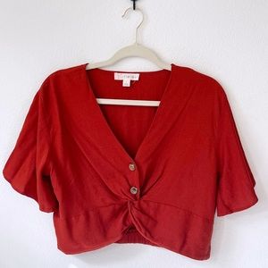 Cropped red blouse